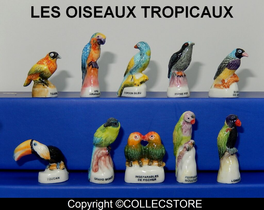 SERIE COMPLETE DE FEVES LES OISEAUX TROPICAUX Fèves de collection