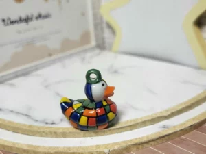 S6T1 FEVE A L'UNITE LES MEDAILLONS CANARDS