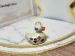 S6T1 FEVE A L'UNITE LES MEDAILLONS CANARDS