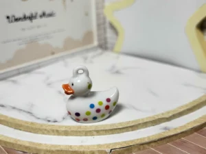 S6T1 FEVE A L'UNITE LES MEDAILLONS CANARDS