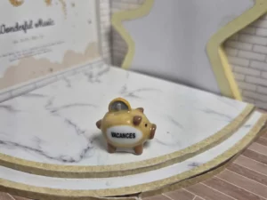 ST8H2 FEVE A L'UNITE COCHON TIRELIRE