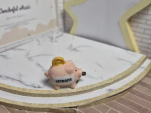 ST8H2 FEVE A L'UNITE COCHON TIRELIRE