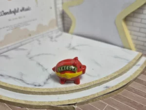 ST8H2 FEVE A L'UNITE COCHON TIRELIRE