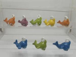 DVO11 SERIE INCOMPLETE DE FEVES LES PENDENTIFS BABY SHARK